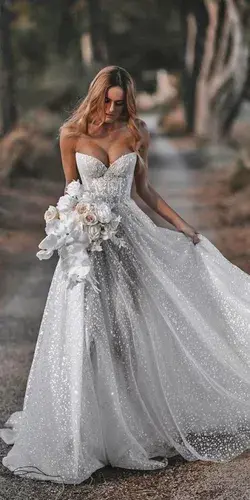 weddingdressesguide.com