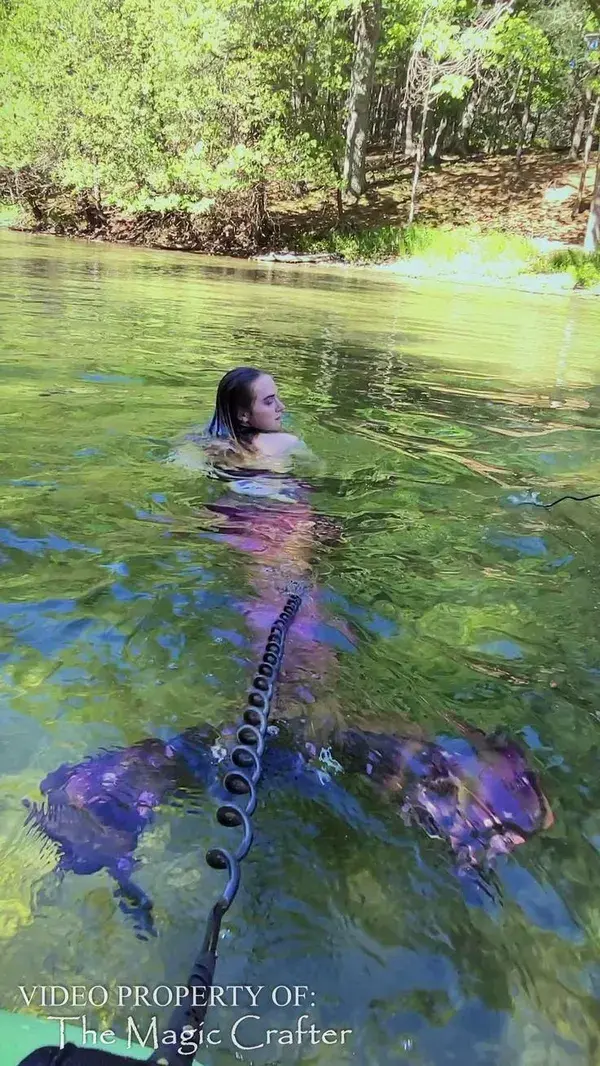 River Mermaid pulls rafts out of the shallow water