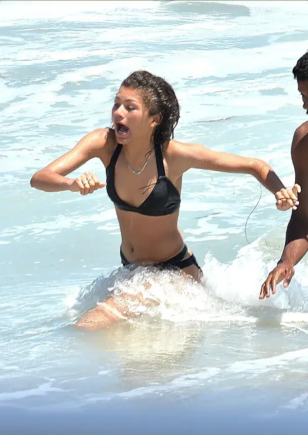 ZENDAYA BLACK BIKINI IN MALÍBU BEACH 2014