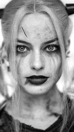 Margot Robbie as Harley Quinn