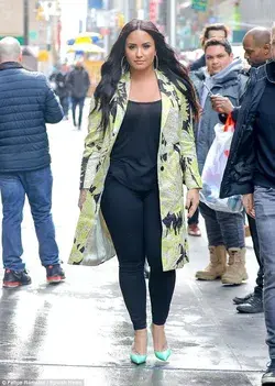 Demi Lovato models sheer black tank top in NYC