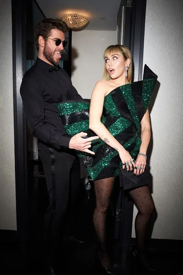 Miley Cyrus and Liam Hemsworth Gave the Met a Couples Moment for the History Books