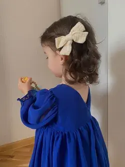 Baby with blue dress