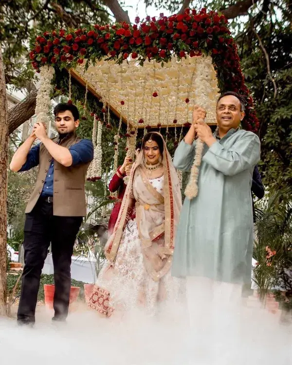 Walking down the aisle happily with her father and brother 💫