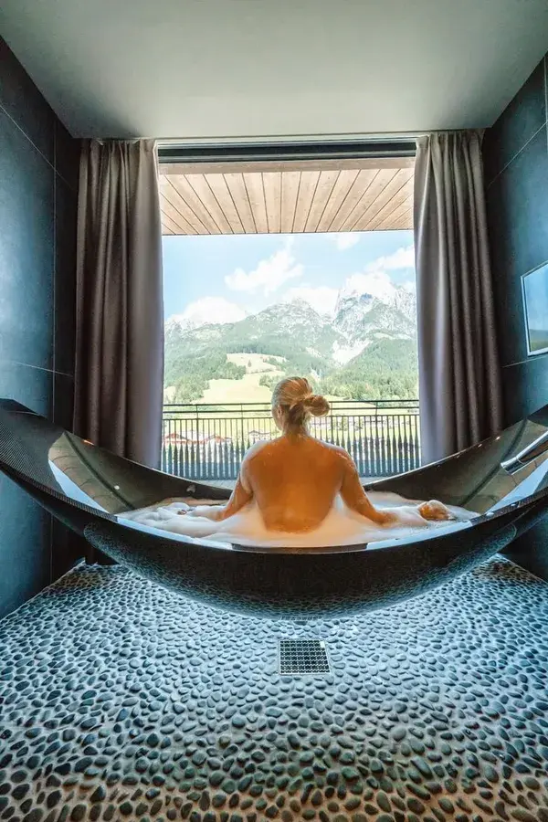 Soak in view of the mountains in a hammock bath!