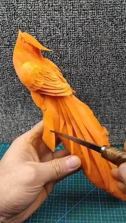 Carrot carving into a nice bird
