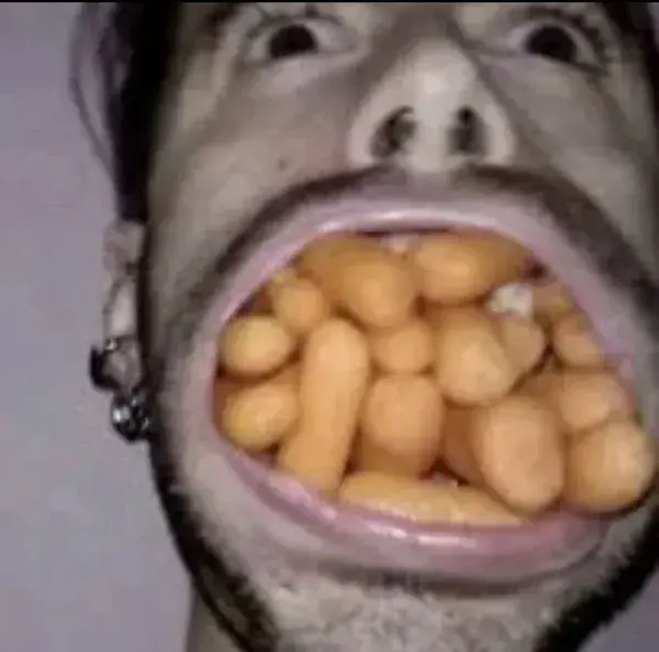 Man with cheeto puffs