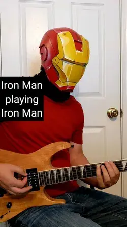 Iron Man playing Iron Man on guitar