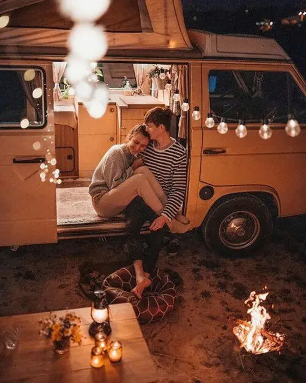 Traveling couple and van / night