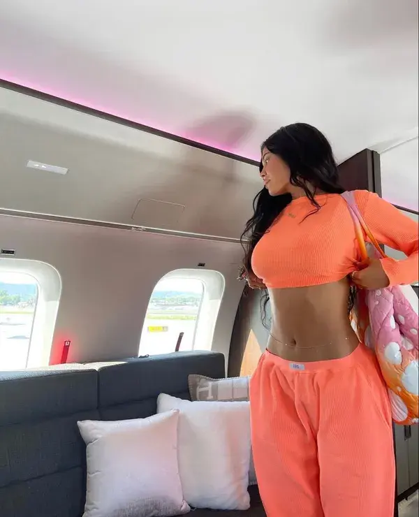 Kylie Jenner posing for Instagram picture on private jet plane