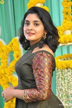 Nivethathomas in blackchecked salwar 