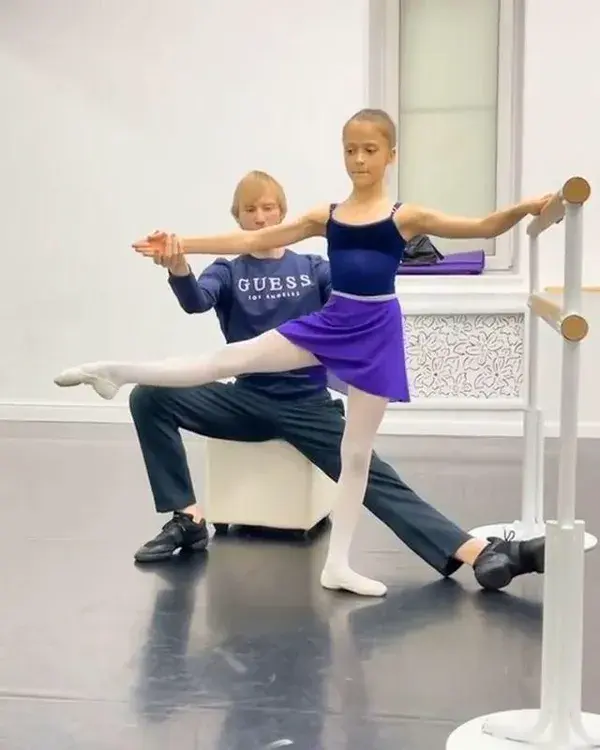 Little ballet dancer Yana Chirkina wearing a Zidans violet chiffon wrap skirt for girls