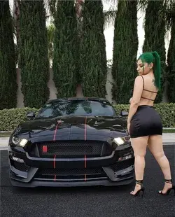 Hot sexy girl and her tuned Ford Mustang