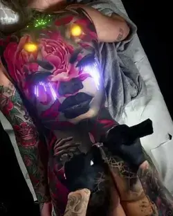 Full back neon ink tattoo