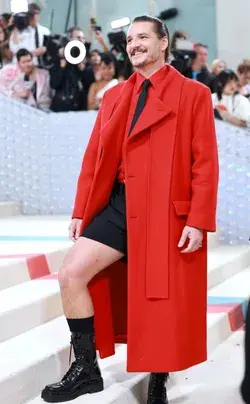 Pedro Pascal red suit and black shorts Met Gala 2023 yes daddy