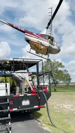 Pilot Lands His Helicopter Neatly Over Truck