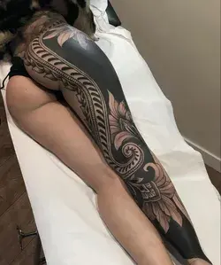 Woman’s Leg Sleeve Tattoo