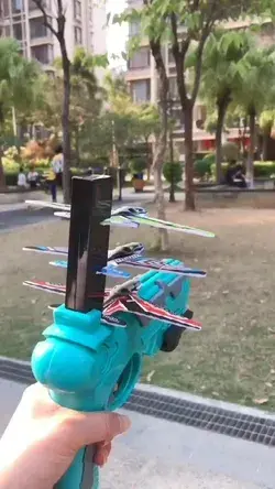 Toy gun launching airplane