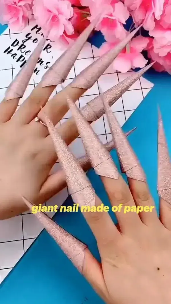 giant nail made of paper