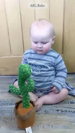 Cute Babies Playing with Dancing Cactus