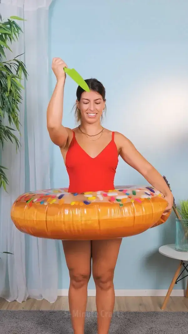 She made a crazy dress out of pool noodles and rubber rings!