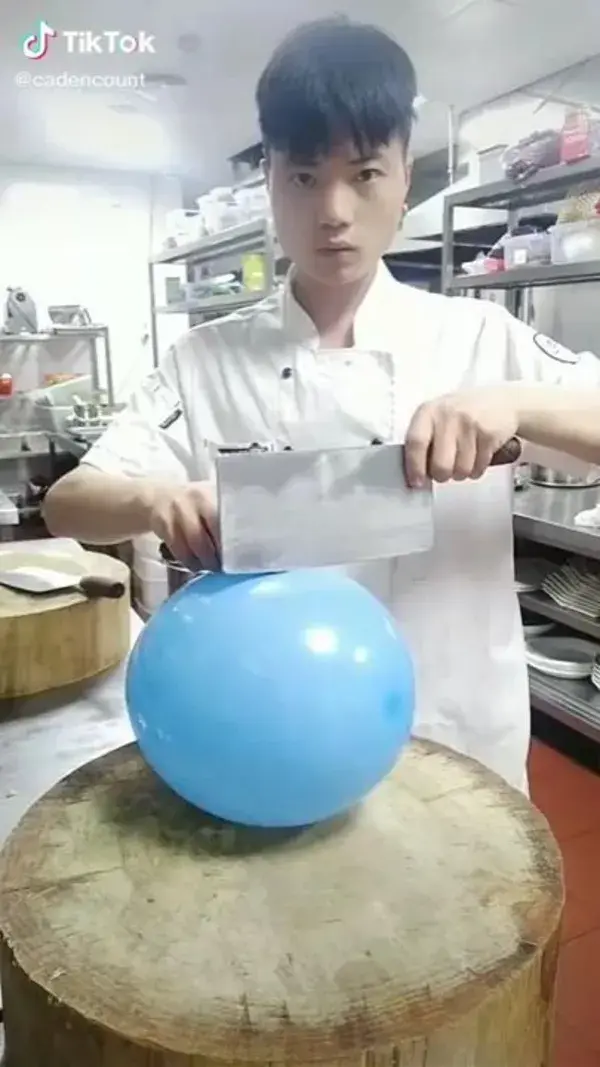 Man shows off his skills with a cleaver