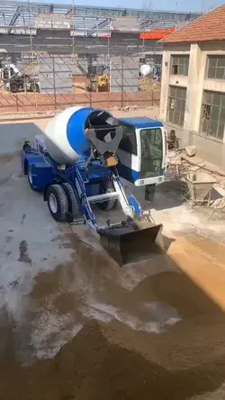 Self-loading concrete mixer.