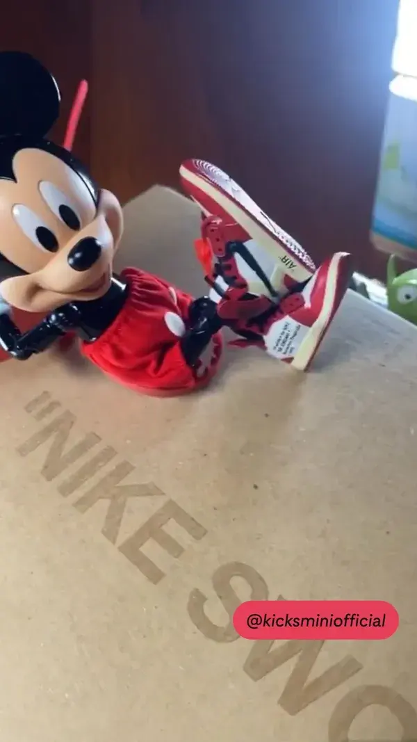 Mickey Mouse with his AJ1 Chicago Off White