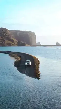 🇮🇸 Would you drive across this flooded road in Iceland?  🎥Credits: benedikteroness.  #technews24h