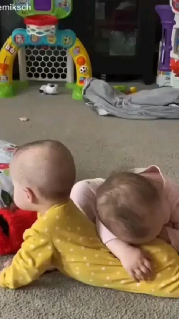 Two cute baby brothers spending their time together.Toddler activities.