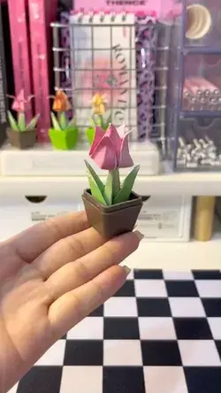 After watching the video. You can fold a pot of tulips out of paper