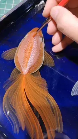 Goldfish acrylic painting-making process on resin layers