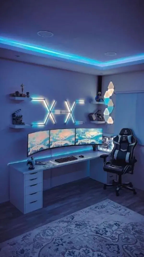 Clean aesthetic Gaming Room Setup with RGB Ambient Lighting