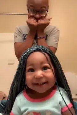Adorable 11-Month-Old Black Baby Girl Can't Stop Smiling with Her New Braid Wig!