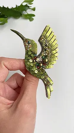 Hummingbird olive green brooch