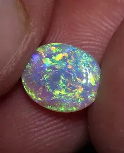 Galaxy Crystal Opal | Rainbow colours inside this gorgeous Australian Gemstone by Black Opal Direct