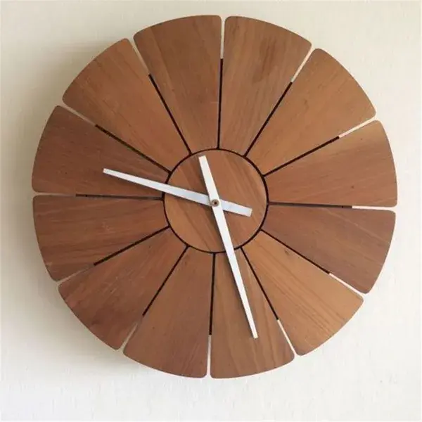 Minimalist wall clock with sleek lines metallic wall clock with geometric shapes