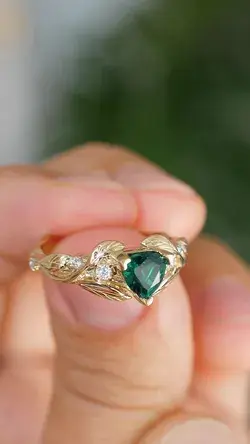 Emerald trillion cut engagement ring, gold leaves and diamonds ring