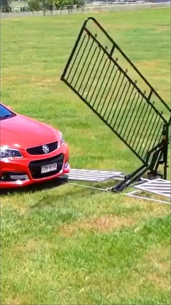 This non-electric gate is powered by the weight of a car.!