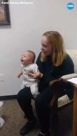 Baby can't stop laughing after finally hearing clearly for the first time